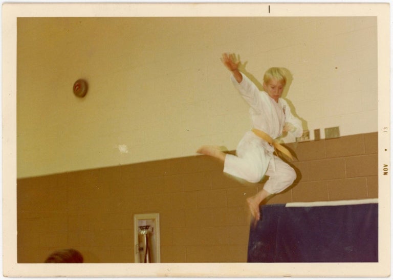 Item #14 KARATE BOY SHOWS OFF MOVES MID-AIR VINTAGE COLOR SNAPSHOT PHOTO